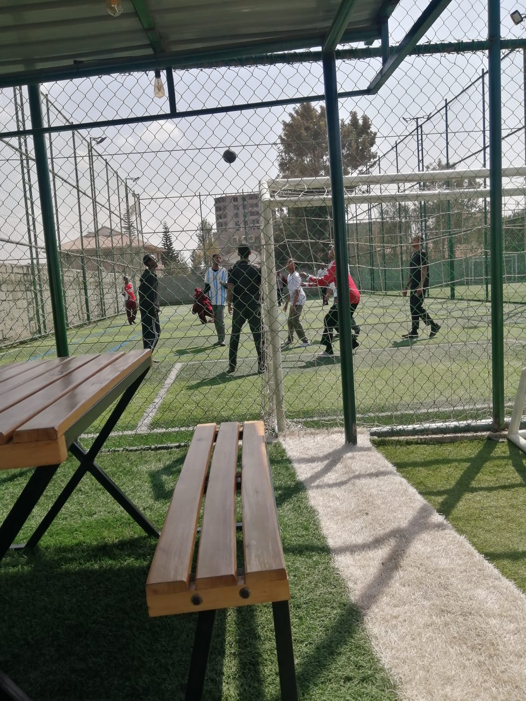 Football at the goal on the school pitch
