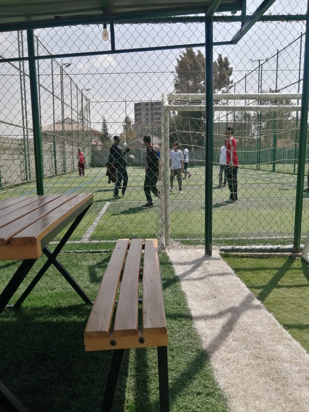 The football pitch from the sideline benches